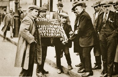 Street hawkers sell football favours, Kings Cross by English Photographer